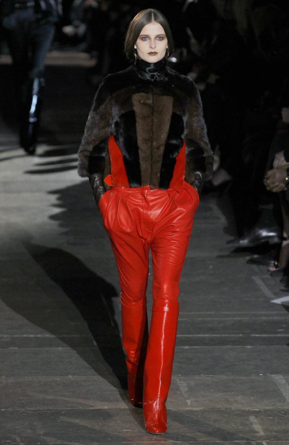 A model wears a creation by Italian fashion designer Riccardo Tisci for Givenchy's fashion house as part of the presentation for Women's Fall-Winter, ready-to-wear 2013 fashion collection, during Paris Fashion week, Sunday, March 4, 2012. (AP Photo/Jacques Brinon)