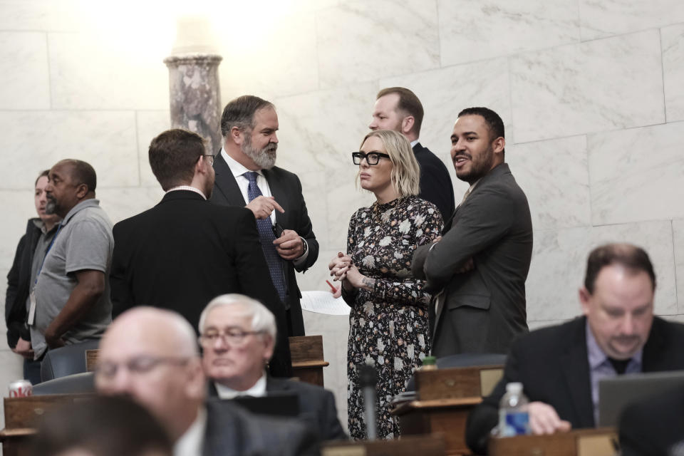 West Virginia state Rep. Kayla Young, D-Kanawha, speaks with colleagues in the House Chambers at the Capitol in Charleston, W.Va., on Wednesday, Jan. 25, 2024. West Virginia has the least amount of female state legislators.(AP Photo/Chris Jackson)