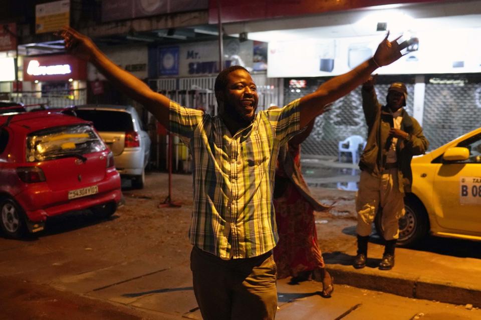 Residents celebrate in Kinshasa, Congo, Thursday Jan. 10, 2019, after learning that opposition presidential candidate Felix Tshisekedi had been declared the winner of the elections. (AP Photo/Jerome Delay)