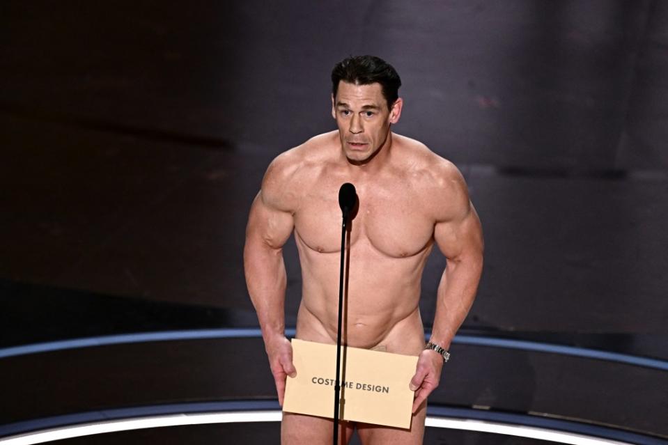 John Cena came out nude, in a tribute to the 1974 Oscars streaker. AFP via Getty Images