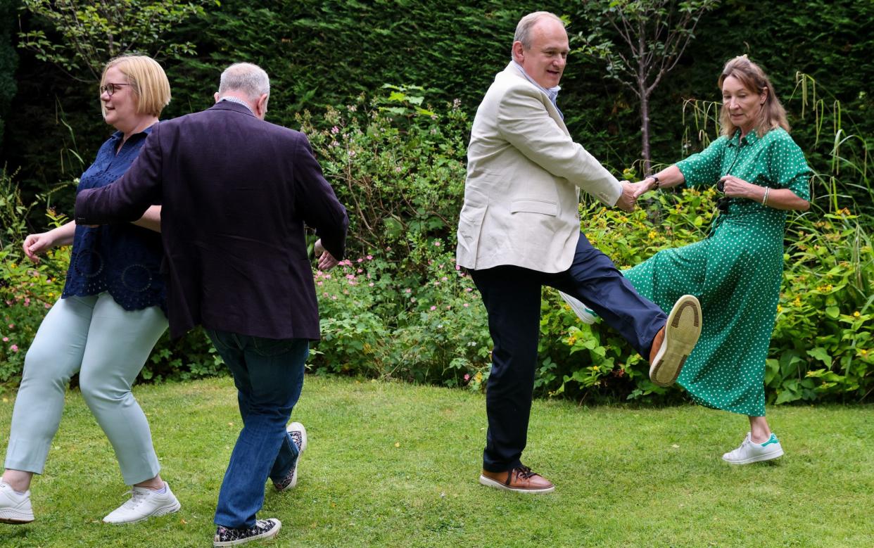 Sir Ed Davey takes part in a swing dancing class at Surrey Swing Dance Society