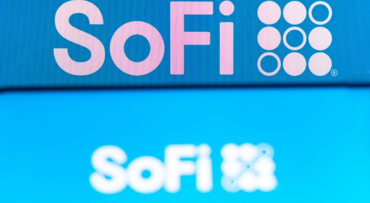 The Social Finance (SoFi) logo is seen on a smartphone and a pc screen