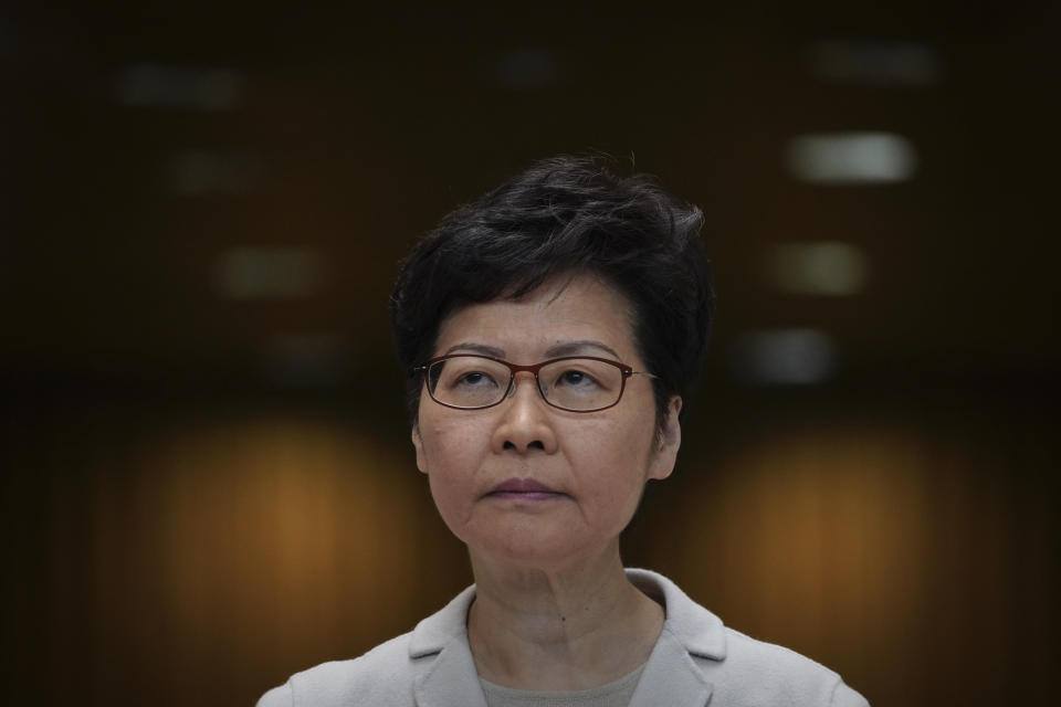 Hong Kong Chief Executive Carrie Lam pauses during a press conference in Hong Kong, Tuesday, Nov. 26, 2019. Lam has refused to offer any concessions to anti-government protesters after a local election setback. (AP Photo/Vincent Yu)