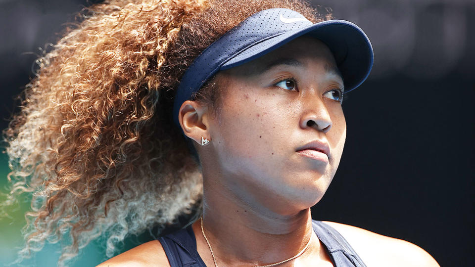 Pictured here, Naomi Osaka looks sad during a tennis match.