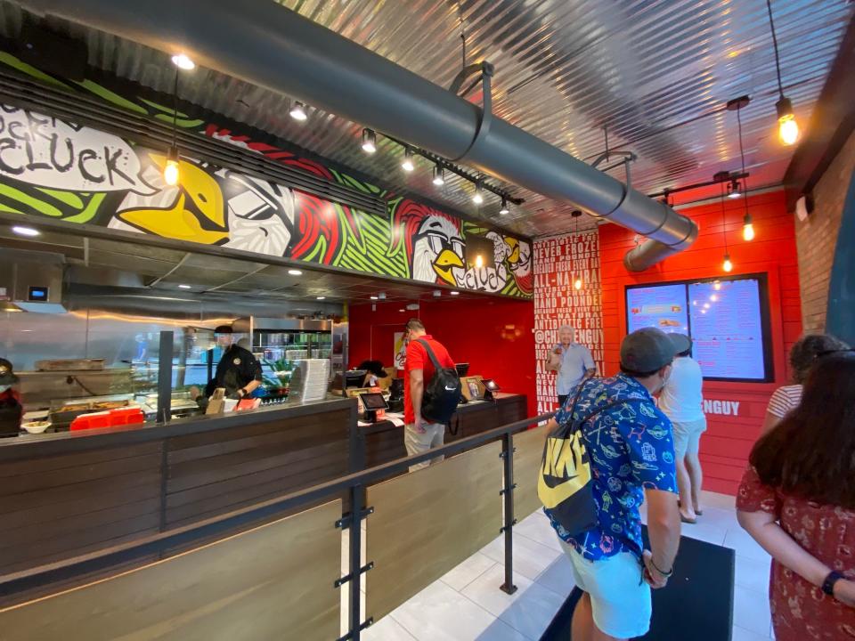 Inside Guy Fieri's Chicken Guy! restaurant at Disney Springs.