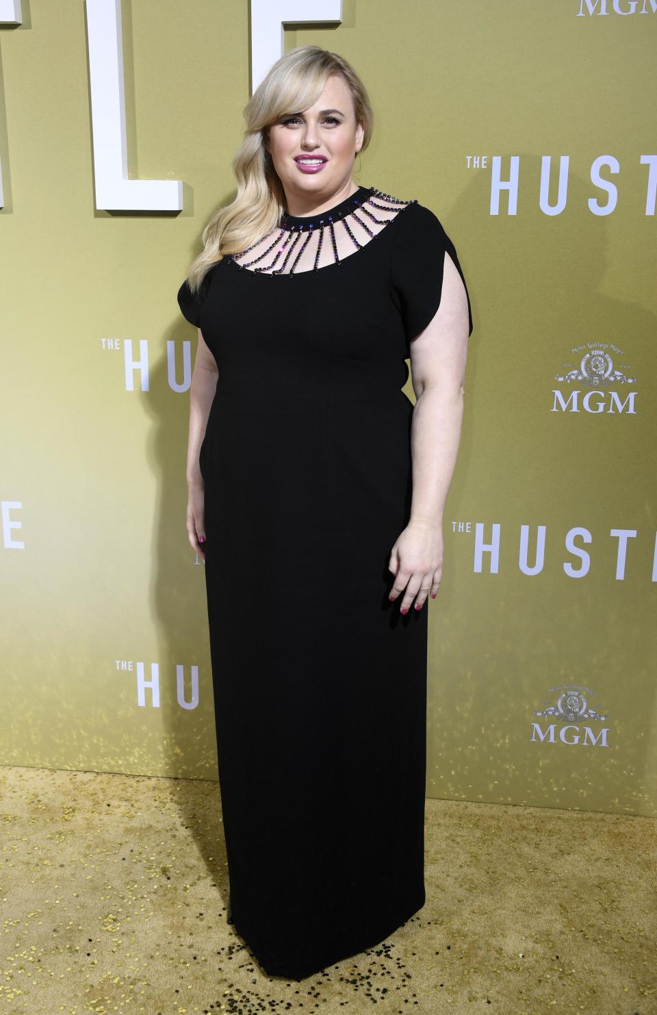 Rebel Wilson is giving us serious old-school Hollywood vibes at the premiere of 'The Hustle' on May 8. She picked a custom Christopher Kane dress, complete with a chain neckline. <em>[Photo: Getty]</em>