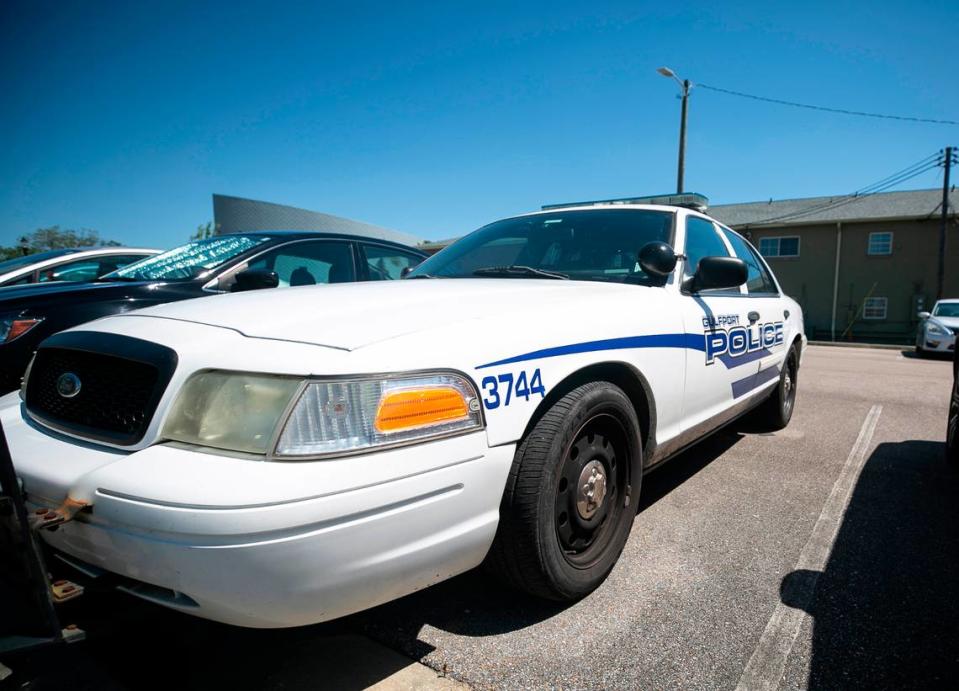 A Gulfport Police Department patrol car sits outside of the police station in downtown.