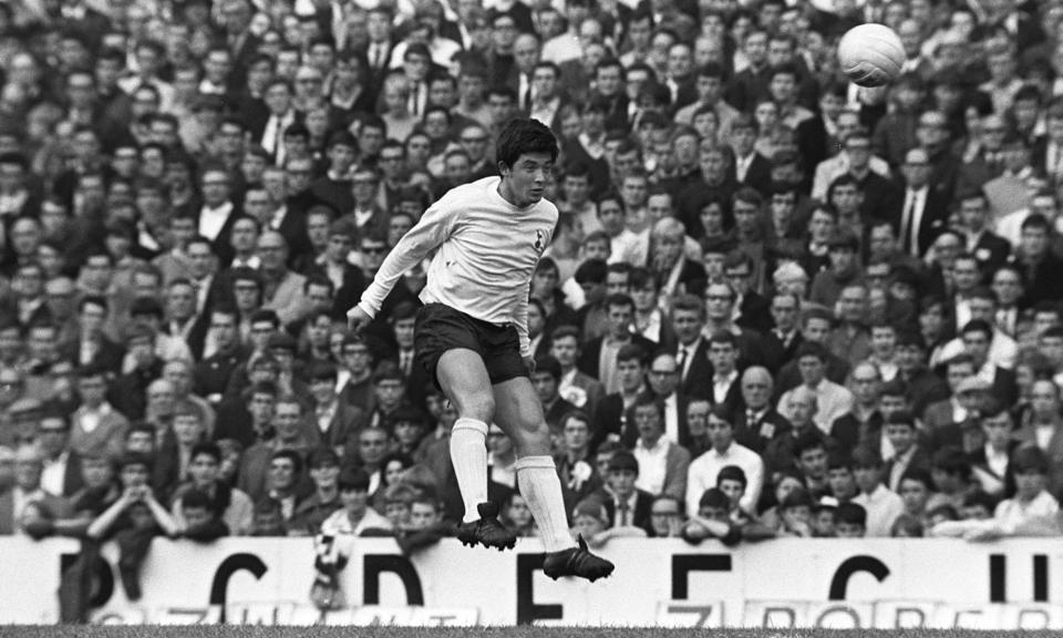 <span>Joe Kinnear heads the ball clear while playing for Tottenham in 1968.</span><span>Photograph: Hulton Archive/Getty Images</span>