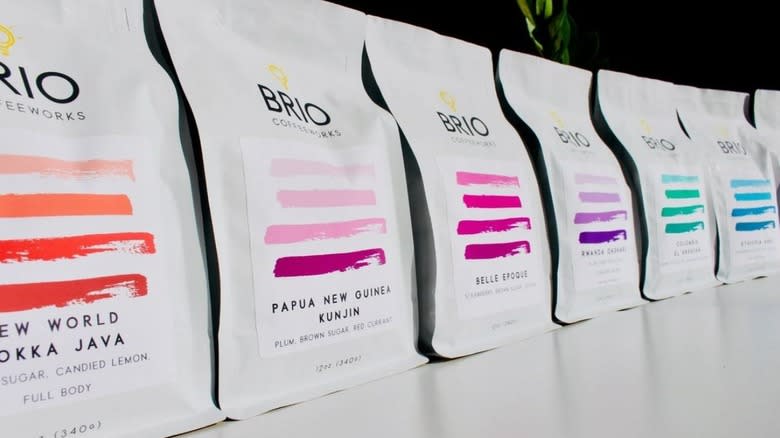 colorful bags of coffee in a row