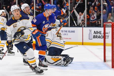 Mar 30, 2019; Uniondale, NY, USA; New York Islanders left wing Anthony Beauvillier (18) celebrates his goal against the Buffalo Sabres during the second period at Nassau Veterans Memorial Coliseum. Mandatory Credit: Dennis Schneidler-USA TODAY Sports