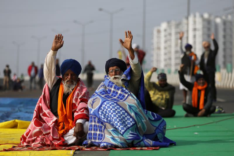 FILE PHOTO: Farmers take part in a protest against the newly passed farm laws at Delhi-Uttar Pradesh border on the outskirts of Delhi