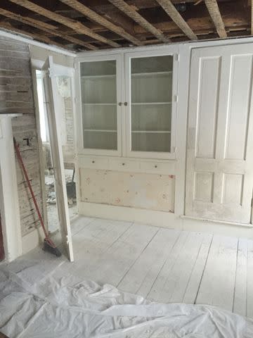 <p>Courtesy of Sarah Madeira Day</p> The hutch before the makeover.