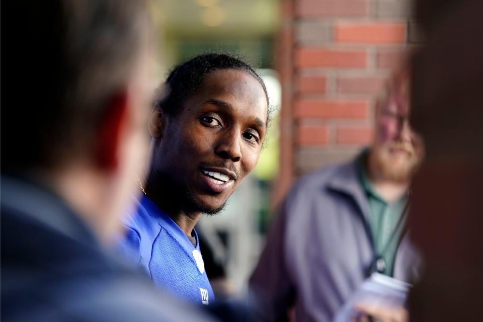 New York Giants cornerback Adoree' Jackson answers a question by NorthJersey.com's Art Stapleton, left, after the organized team activities (OTA's) at the Giants training center on Wednesday, May 31, 2023, in East Rutherford.