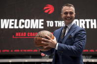 Toronto Raptors NBA basketball team new head coach Darko Rajakovic poses for a photo following a media availability in Toronto on Tuesday, June 13, 2023. (Chris Young/The Canadian Press via AP)