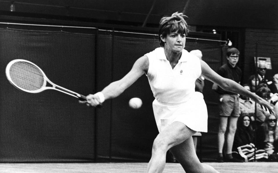 Australian Margaret Court races to return the ball to Billie Jean King during the Wimbledon women's singles finals on July 3, 1970. - BETTMANN