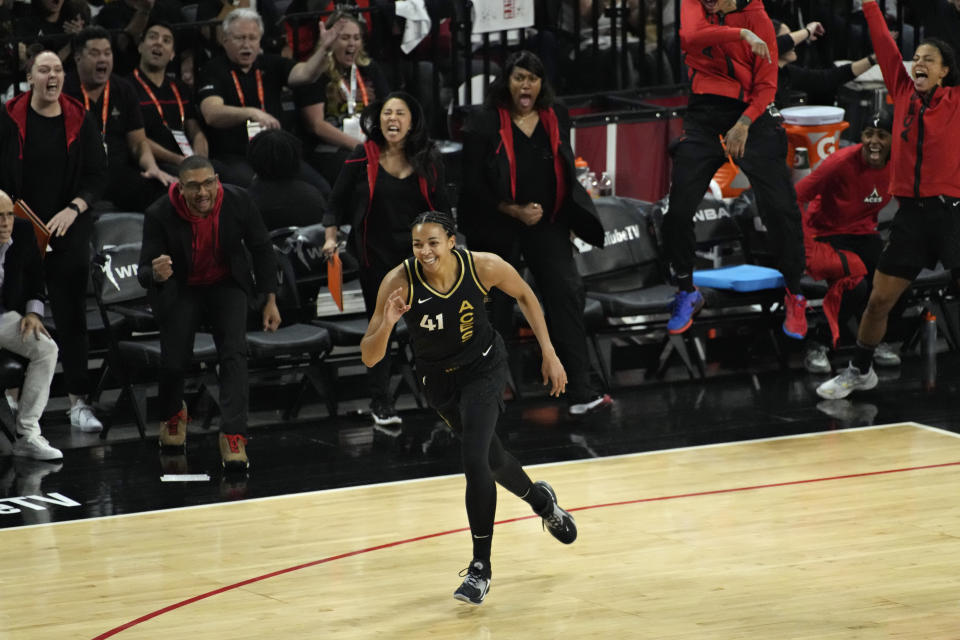 Las Vegas Aces center Kiah Stokes celebrates after making a 3-pointer against the New York Liberty during Game 2 of the WNBA Finals on Wednesday in Las Vegas. (AP Photo/John Locher)