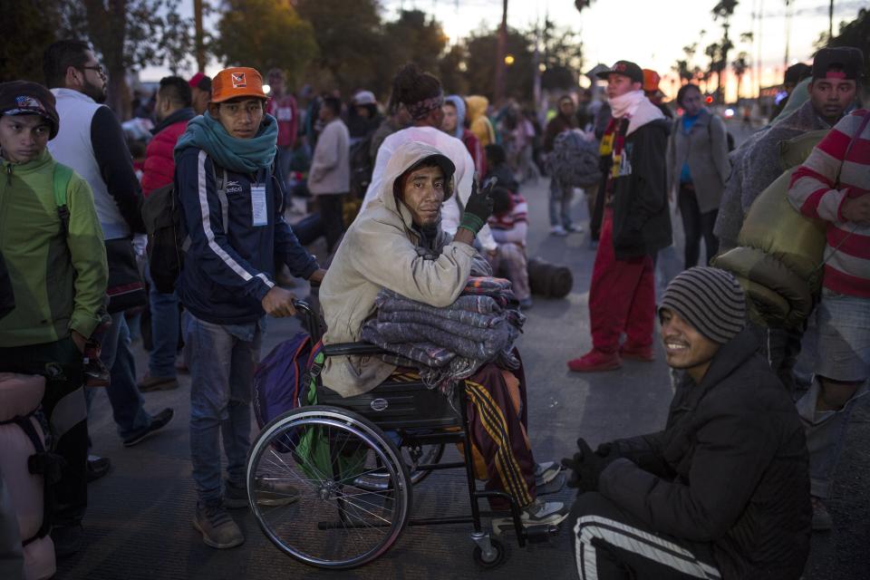 Central American migrants, part of the Central American caravan trying to reach the United States, continue their journey as they prepare to leave Mexicali, Mexico, Tuesday, Nov. 20, 2018. Tensions have built as nearly 3,000 migrants from the caravan poured into Tijuana in recent days after more than a month on the road, and with many more months likely ahead of them while they seek asylum in the U.S. (AP Photo/Rodrigo Abd)