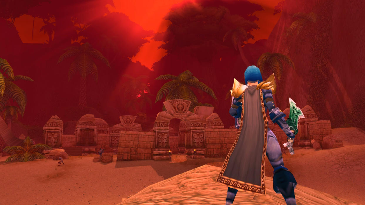  WoW SoD Phase 2 - a player is standing in a red-skied Stranglethorn Vale during the Blood Moon PvP event. 