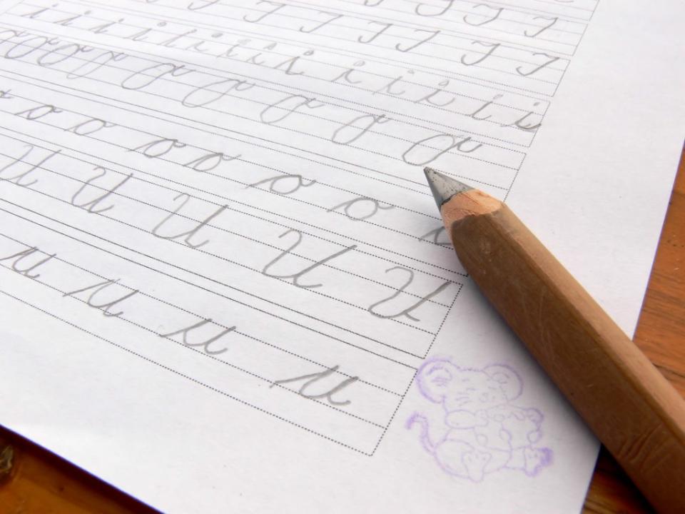 “It is like the telephone on the wall,” Tracy Bendish, an ABA autism therapist for Jefferson Public Schools in New Jersey, said while describing the effects of diminishing cursive use. “Less and less used and then not there anymore.” Marina Lohrbach – stock.adobe.com
