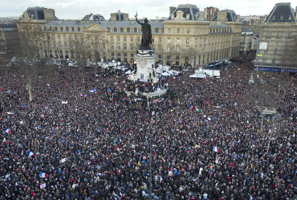 Thousands of people began filling France's iconic Republique plaza. (AP Photo/Peter Dejong)