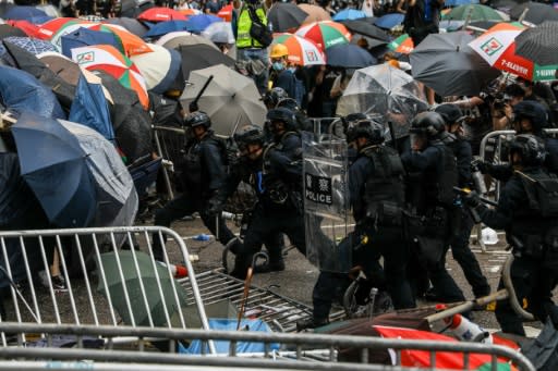 Protesters used umbrellas to protect themselves from pepper spray