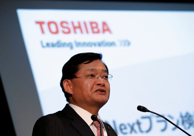 FILE PHOTO: Toshiba Corp's CEO Nobuaki Kurumatani attends a news conference in Tokyo