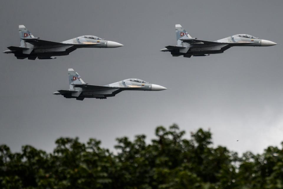 Russian-made Venezuelan Air Force Su-30MKV multirole fighters overfly a military parade to celebrate the 206th anniversary of Venezuelan independence in Caracas on July 5, 2017. <em>FEDERICO PARRA/AFP via Getty Images</em>