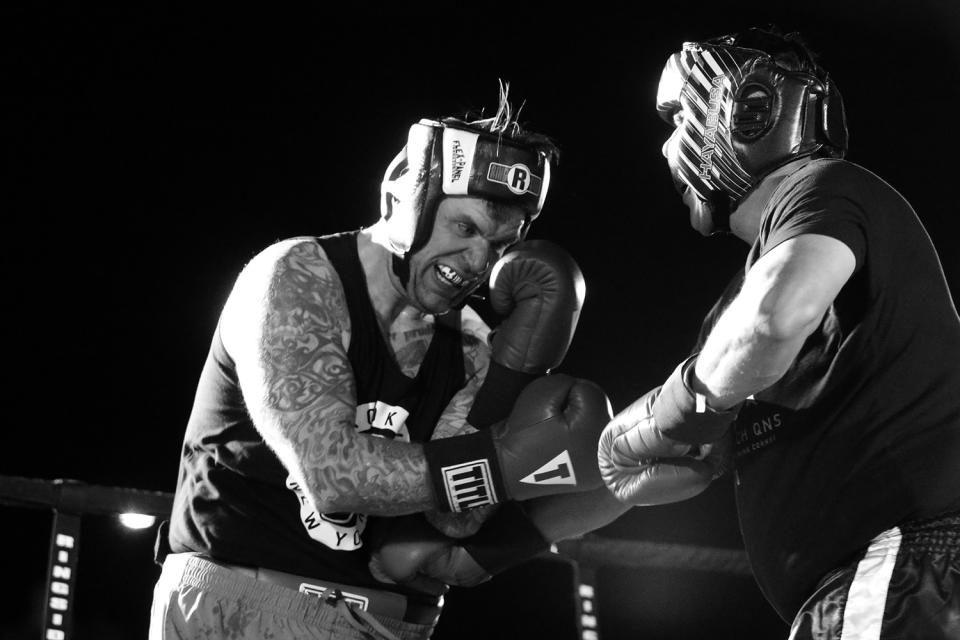 <p>Sgt. John Keigans and Sgt. Billy Polanco mix it up during a grudge match at the Brooklyn Smoker in the parking lot of Gargiulo’s Italian restaurant in Coney Island, Brooklyn, on Aug. 24, 2017. (Photo: Gordon Donovan/Yahoo News) </p>