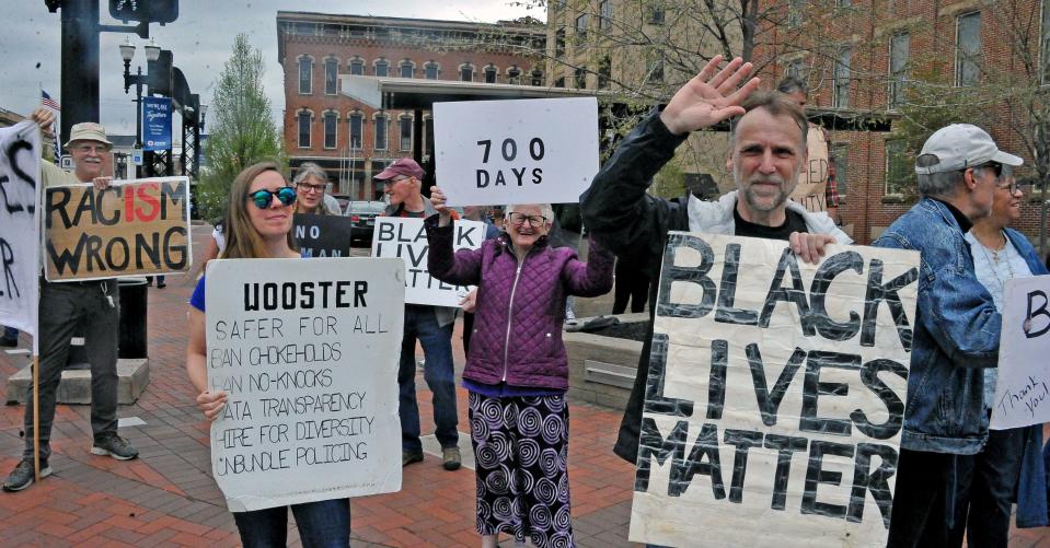 Desiree Weber, Linda Houston and Herb Weber were among 50 demonstrators holding signs Sunday in downtown Wooster to show their support for the Black Lives Matter movement. Sunday marked the 700th consecutive day of demonstrating as the local NAACP and Racial Justice Coalition seek police policy reforms.