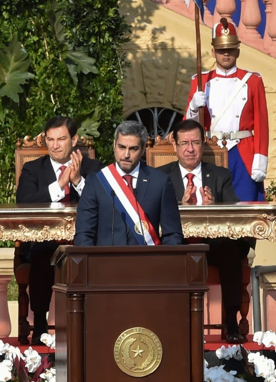 Paraguay's new President Mario Abdo Benitez (C) delivers a speech after being sworn-in, in Asuncion, on August 15, 2018