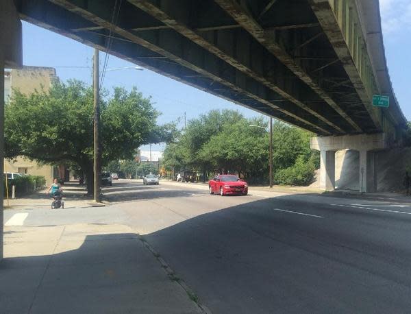 Cars pass under the I-16 flyover at Martin Luther King Jr. Boulevard.