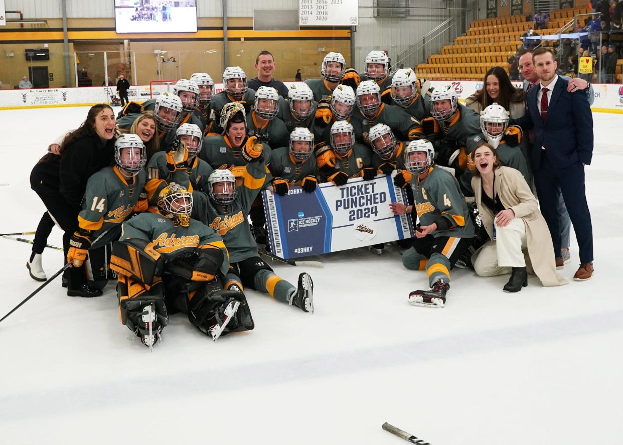 Adrian College women's hockey celebrates after earning a trip to the NCAA Division III Frozen Four next week at Wisconsin-River Falls.