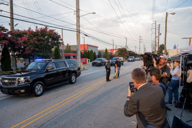 Former president Donald Trump's motorcade arrives at the Fulton County Jail intake center in Atlanta, Ga., on Thursday. After his arrest, the former president was designated as inmate No. P01135809. Photo by Anthony Stalcup/UPI