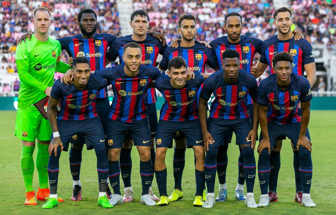 FC Barcelona players pose for a photo before the start of their friendly soccer match against Inter Miami CF at DRV PNK Stadium on Tuesday, July 19, 2022, in Fort Lauderdale, Fla.