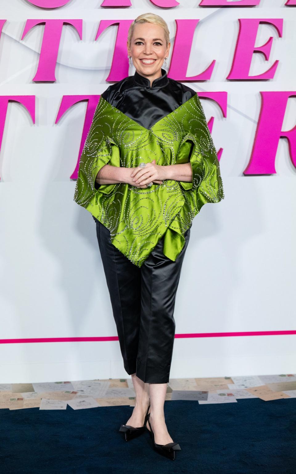 Olivia Colman's black and green Prada look at the London premiere of Wicked Little Letters featured a tangerine collar