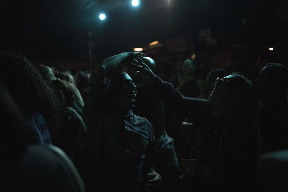 Fans of the Sonido Gallo Negro dance during one of the last active weekends at the iconic counterculture venue Multiforo Alicia in Mexico City, Friday, Feb. 24, 2023. The owner and founder of Alicia Ignacio Pineda said one of the main reasons he chose to close is because he doesn’t like how the neighborhood around the venue has changed. (AP Photo/Eduardo Verdugo)