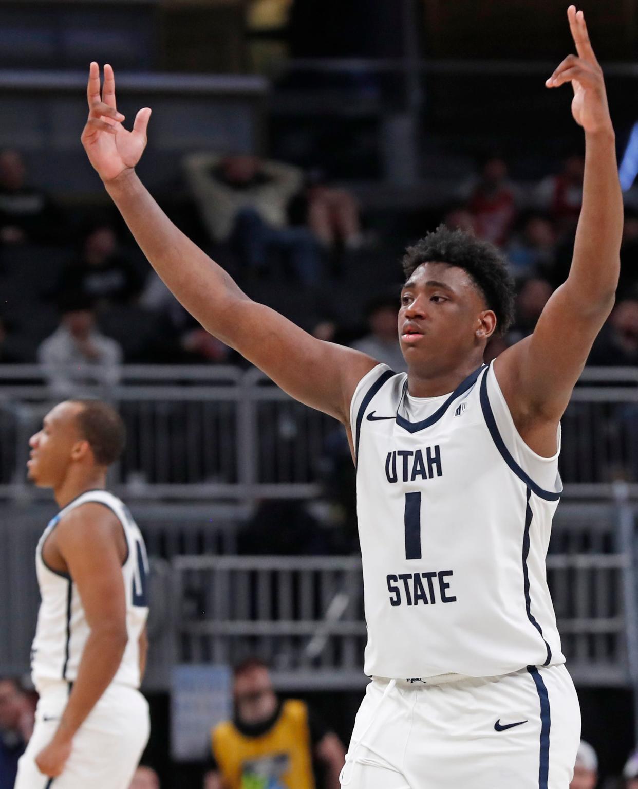 Utah State Aggies forward Great Osobor (1) reacts after scoring during NCAA Men’s Basketball Tournament game against the TCU Horned Frogs, Friday, March 22, 2024, at Gainbridge Fieldhouse in Indianapolis. Utah State Aggies won 88-72.