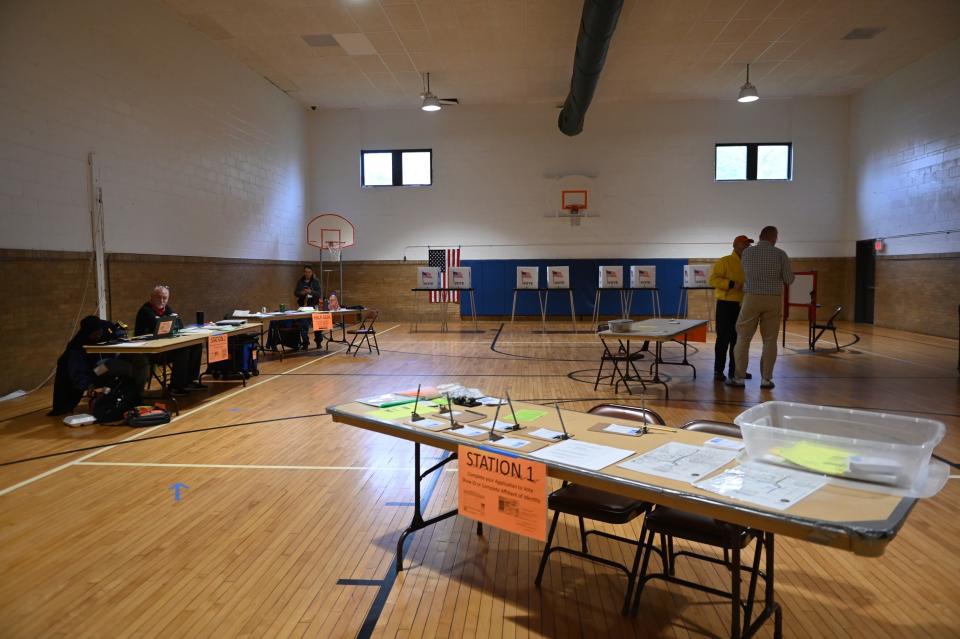 Voters cast their ballots at Foster Community Center on Tuesday, Nov. 7, 2023, in Lansing.