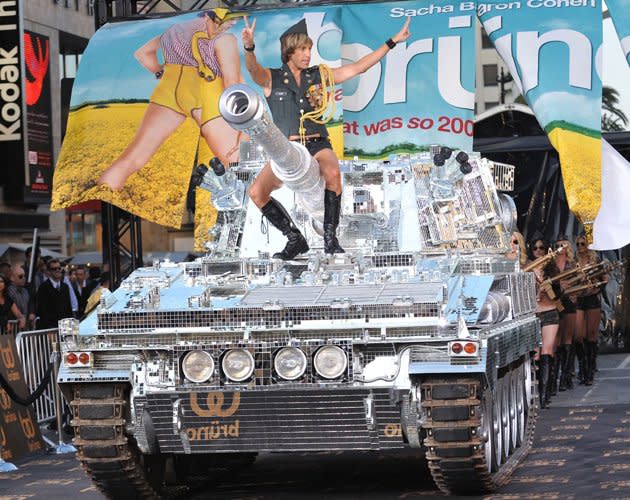 Dressed in knee-high boots, leather hip huggers, and fabulous army regalia, Cohen, again in character, showed up to the Los Angeles 'Bruno' premiere riding a giant mirrored tank that resembled a dangerous disco ball. While folks in Hollywood are used to some wild sites, Bruno and his army of beautiful machine gun-toting models definitely raised a few eyebrows.