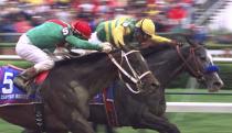 FILE - Captain Bodgit (5), ridden by Alex Solis, battles Silver Charm, ridden by Gary Stevens, for the finish of the Kentucky Derby at Churchill Downs in Louisville, Ky., on Saturday, May 3, 1997. Silver Charm won in a photo finish. (AP Photo/Timothy D. Easley, File)