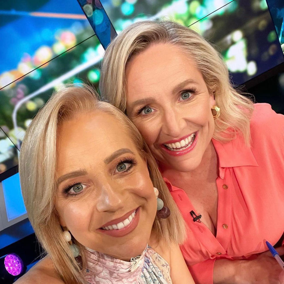 Carrie Bickmore and Fifi Box smile on the set of The Project