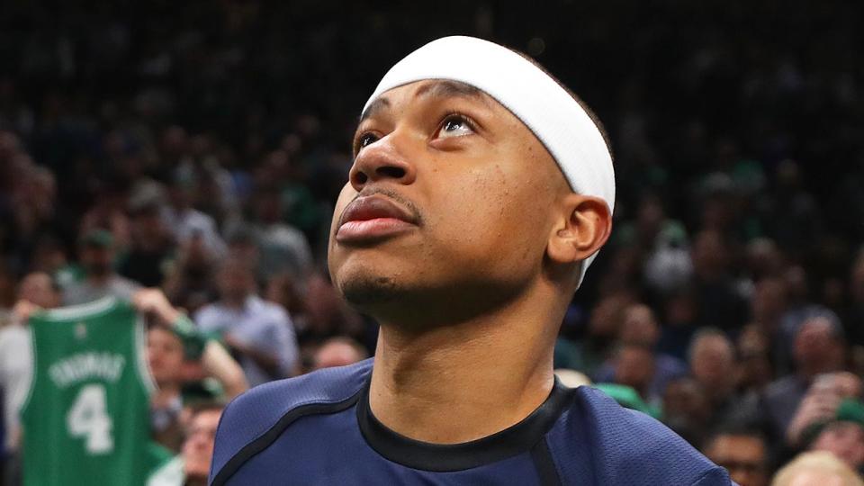 Isaiah Thomas of the Denver Nuggets watches a tribute video in his honour during the first quarter of the game against the Boston Celtics at TD Garden on March 18.