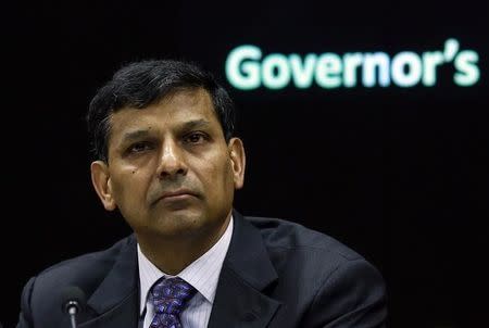 The Reserve Bank of India (RBI) Governor Raghuram Rajan listens to a question during a news conference after the bi-monthly monetary policy review in Mumbai September 30, 2014. REUTERS/Danish Siddiqui