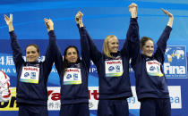 SHANGHAI, CHINA - JULY 30: (L-R) Natalie Coughlin, Rebecca Soni, Dana Vollmer and Melissa Franklin of the United States celebrate their gold medals in the Women's 4x100m Medley Relay during Day Fifteen of the 14th FINA World Championships at the Oriental Sports Center on July 30, 2011 in Shanghai, China. (Photo by Clive Rose/Getty Images)