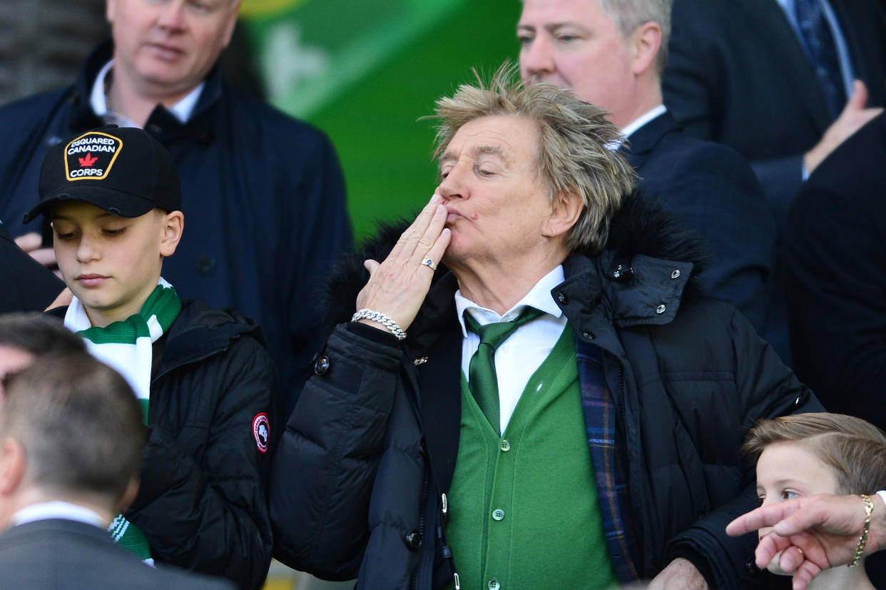 GLASGOW, SCOTLAND - MARCH 31: Celtic fan and musician Rod Stewart blows a kiss to fans during the Ladbrokes Scottish Premiership match between Celtic and Rangers at Celtic Park on March 31, 2019 in Glasgow, Scotland. (Photo by Mark Runnacles/Getty Images)