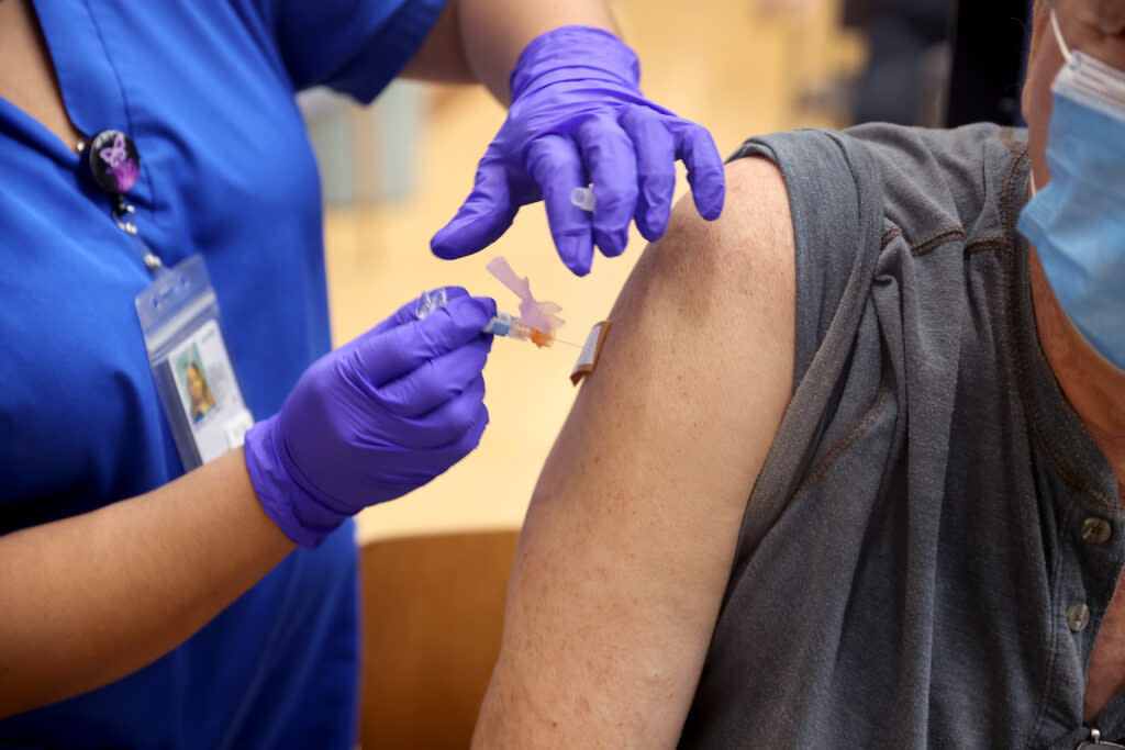 Flu vaccine being administered