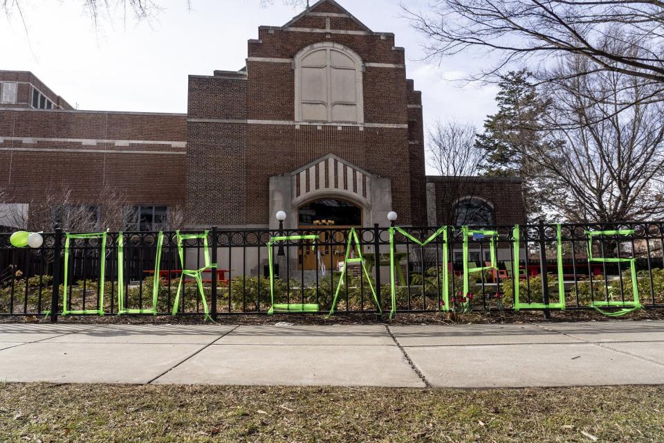 Memorials remain outside of the MSU Union on Monday, February 20, 2023, following a mass shooting that occurred last week on the campus of Michigan State University in East Lansing.