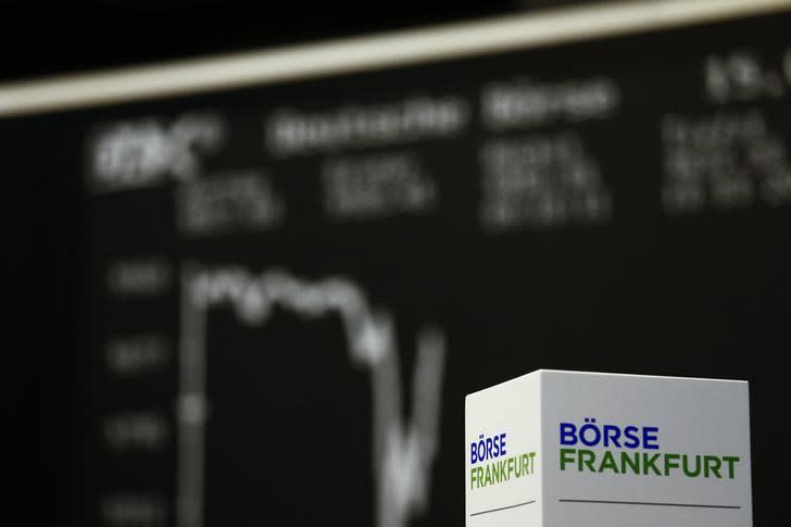 FILE PHOTO: A box with text 'Frankfurt stock exchange' is pictured in front of the German share price index DAX board at the Frankfurt stock exchange