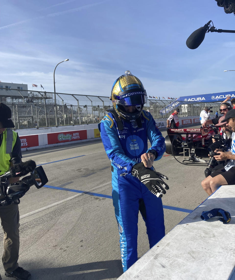 Jimmie Johnson prepares for practice at the Grand Prix of Long Beach, Calif., on Saturday, April 9, 2022. Johnson fractured his hand in a crash on Friday and was fitted with a carbon fiber splint that he tested in Saturday practice. (AP Photo/Jenna Fryer)