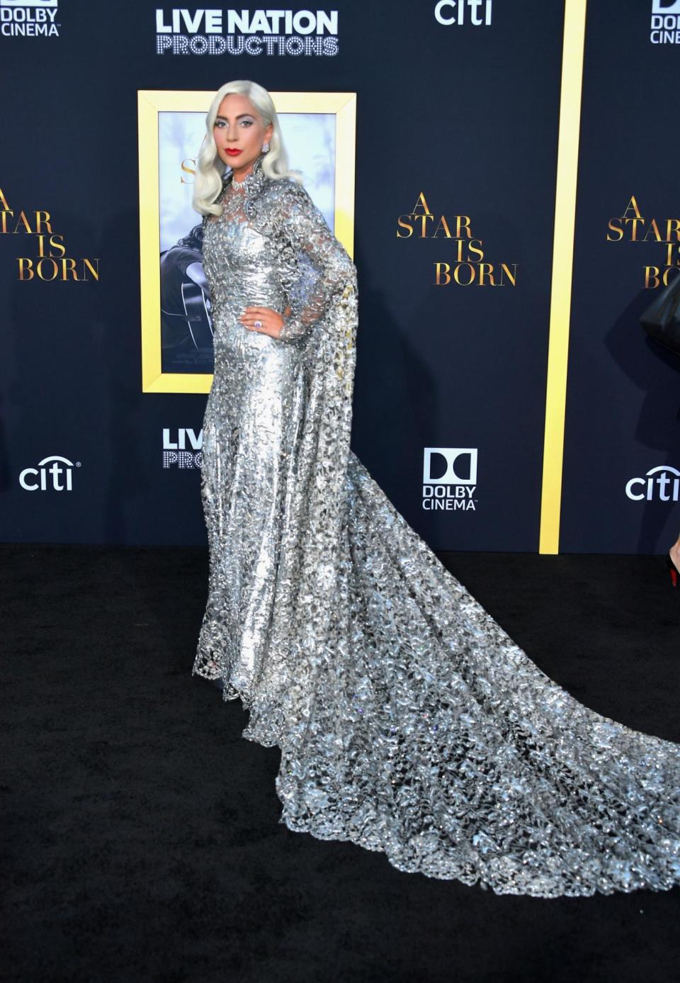 Silver star: Lady Gaga posing at the premiere of her latest film (Getty Images)